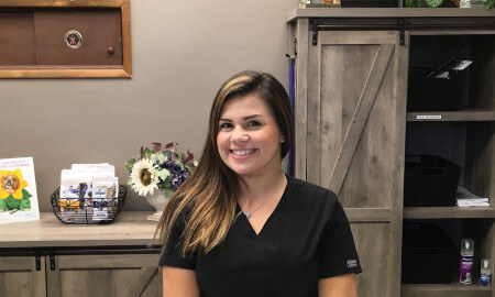 Noelle at the front desk